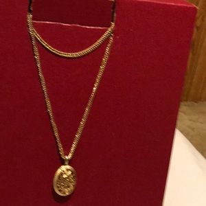 Gold tone locket
